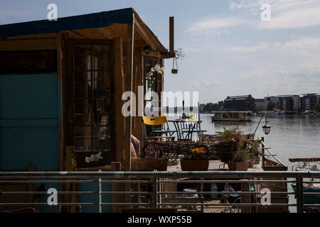 A houseboat moored on the shore of the Rummelburger See in Berlin, Germany. Stock Photo