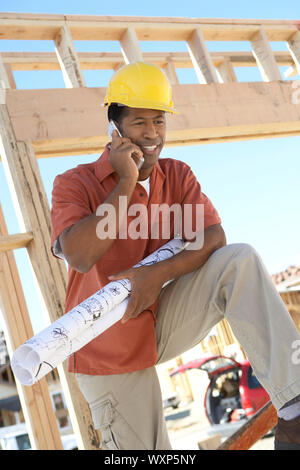 Architect Holding Blueprints Stock Photo