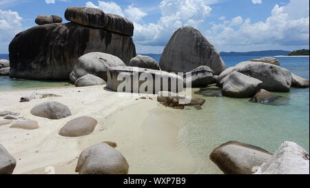 Indonesia Anambas Islands huge sea rocks beach wallpaper Stock Photo