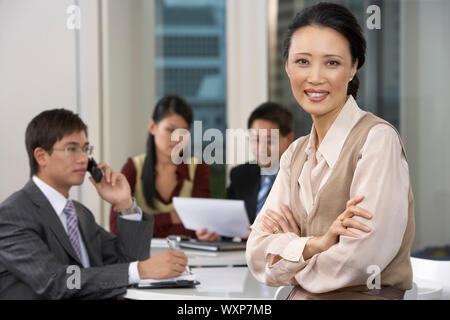 Businesswoman Working in Office Stock Photo
