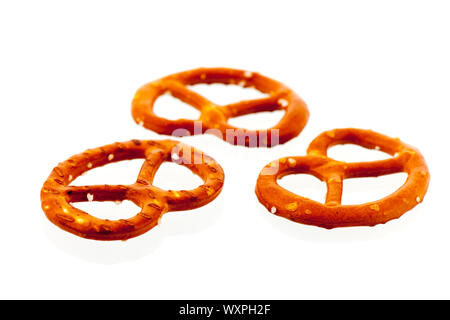 Several German pretzels isolated over white background Stock Photo