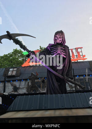 BERLIN - May 17, 2017: Spooky Skeleton with a Scythe - Ghost Train Puppet/Animatronic on German Funfair Stock Photo