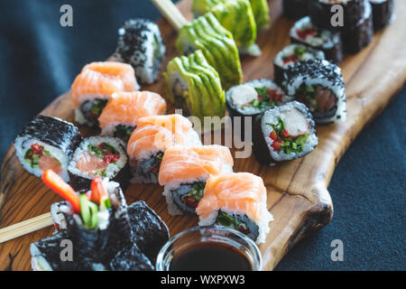 Sushi on wooden  service plate