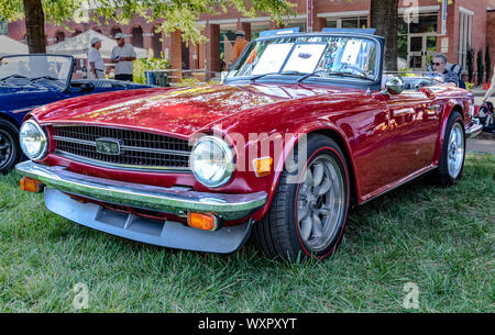 HICKORY, NC, USA-7 SEPT 2019: 1976 Triumph TR6 convertible, last year of production. Burgundy.  View from driver's side front. Stock Photo