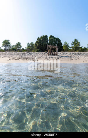 Sandy Beach and mediterranean sea during summer with copy space, Ghisonaccia, Corsica, France Stock Photo
