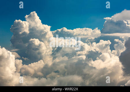 White clouds are seen against the blue sky. Stock Photo