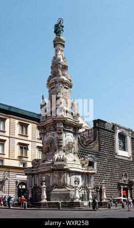 Spire of Immaculate Virgin; guglia; statues; Piazza del Gesu Nuovo; 1750; Neapolitan baroque; religious art, Catholic, large, ornate, Naples; Italy; E Stock Photo