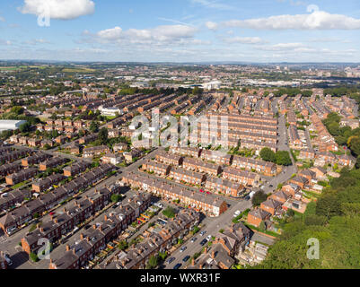 Aerial photo of the town known as Beeston in Leeds West Yorkshire UK, showing a rows of houses in a typical British housing estate taken with a drone Stock Photo