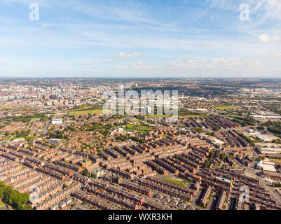 Aerial photo of the town known as Beeston in Leeds West Yorkshire UK, showing a rows of houses in a typical British housing estate taken with a drone Stock Photo