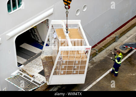 Supplies Being Loaded into the Cargo Hold of a Cruise Ship in the Port of Vancouver, Vancouver, B. C., Canada. June 8, 2019 Stock Photo