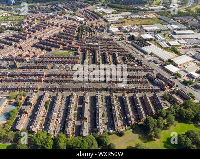 Aerial photo of the town known as Beeston in Leeds West Yorkshire UK, showing a rows of houses in a typical British housing estate taken with a drone Stock Photo