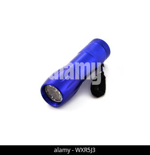 Small metal led flashlight in blue color on white background. Stock Photo