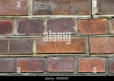Old vintage cracked  burgundy bricks texture Stock Photo