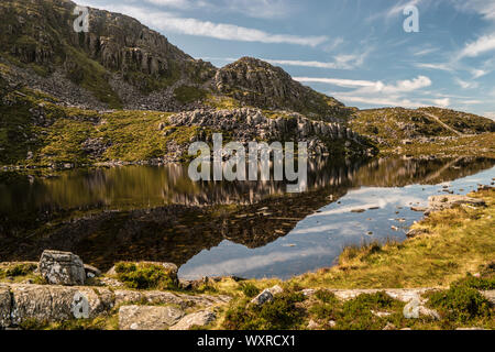 Walk from Llyn Bychan, Roman Steps and Llyn Du to Rhinog Fawr. Stock Photo