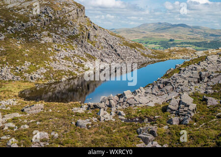 Walk from Llyn Bychan, Roman Steps and Llyn Du to Rhinog Fawr. Stock Photo