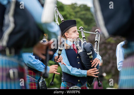 Burntisland and District Pipe Band playing bagpipes at Peebles highland games. Scottish borders, Scotland Stock Photo