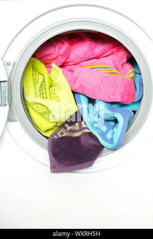 Color towels in an automatic washing machine Stock Photo
