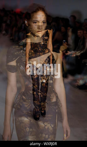 London, UK. 17th Sep, 2019. The multi-exposure photo taken on Sept. 17, 2019 shows a model walking the runway at the Charlotte Knowles show during the London Fashion Week in London, Britain. Credit: Han Yan/Xinhua/Alamy Live News Stock Photo