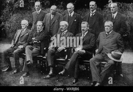The new cabinet in the garden of Downing Street, 24th August 1931. By 1931 the economy was in crisis, both in Britain and around the world, with the onset of the Great Depression. Baldwin and the Conservatives entered into a coalition with Labour Prime Minister Ramsay MacDonald. This decision led to MacDonald's expulsion from his own party. Back row (left to right): C Lister, J Thomas, Rufus Isaacs, (Lord Reading), Neville Chamberlain and S Hoare (Viscount Templewood). Front row (left to right): Philip Snowdon, Stanley Baldwin, prime minister Ramsay MacDonald, H Samuel and Lord Stanley. Stock Photo