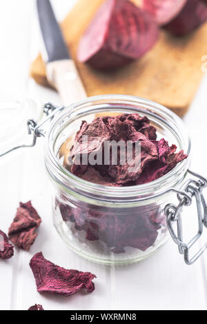 Tasty raw beetroot. Dried beetroot in jar. Stock Photo