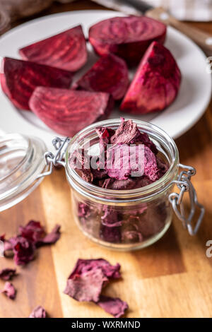 Tasty raw beetroot. Dried beetroot in jar. Stock Photo