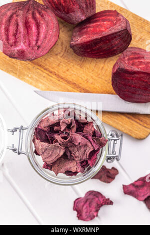 Tasty raw beetroot. Dried beetroot in jar. Top view. Stock Photo