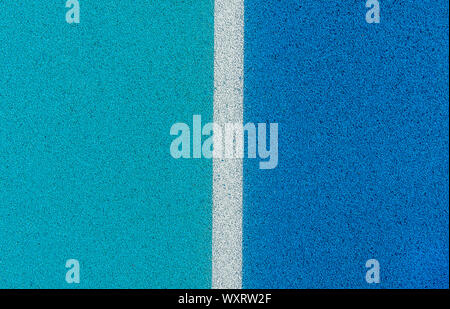 Colorful Sports Court Background. Top view blue field rubber ground with white line outdoors Stock Photo