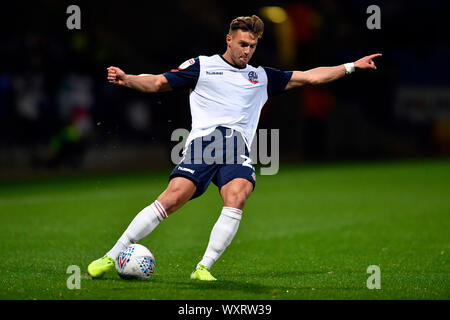 17th September 2019; University of Bolton Stadium, Bolton, Lancashire, England; Sky Bet English Football League One, Bolton Wanderers versus Oxford United; Dennis Politic of Bolton Wanderers crosses the ball - Strictly Editorial Use Only. No use with unauthorized audio, video, data, fixture lists, club/league logos or 'live' services. Online in-match use limited to 120 images, no video emulation. No use in betting, games or single club/league/player publications Stock Photo