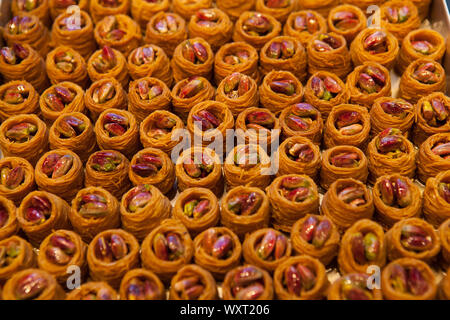 Display of pastries and sweets in a bakery window in Istanbul, Turkey Stock Photo