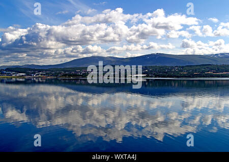 Mountains in the background of an expansive fjord in Norway Stock Photo