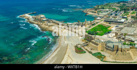 Aerial panorama view of Casarea Maritima, ancient walled city from the Roman, Byzantine and Crusader era with city walls, bastions on the coast of the Stock Photo