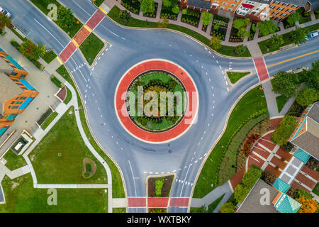 American neighborhood intersection with three way roundabout aerial view Stock Photo