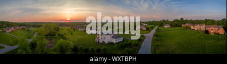 Aerial panorama of American luxury real estate neighborhood in Maryland with single family houses, mansions, high quality buildings with lot of land Stock Photo