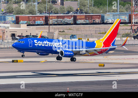 Phoenix, Arizona – April 8, 2019: Southwest Airlines Boeing 737-800 airplane at Phoenix Sky Harbor airport (PHX) in the United States. Stock Photo