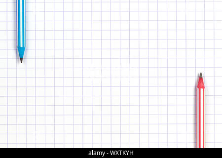 Two striped pencils on white squared paper notebook background. Top view Stock Photo