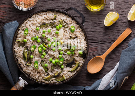 deliciously ella, recipe, vegan recipes, vegetarian recipes, seafood paella recipe, brown rice, calasparra, paella valenciana Stock Photo