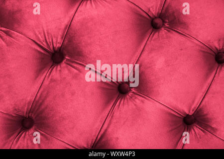 Furniture design, classic interior and royal vintage material concept - Pink luxury velour quilted sofa upholstery with buttons, elegant home decor te Stock Photo