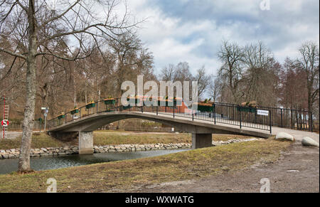 Lilla Sjotullsbron a concrete pedestrian bridge crossing Djurgardsbrunnskanalen (Djurgarden Canal), Djurgarden, Stockholm, Sweden Stock Photo