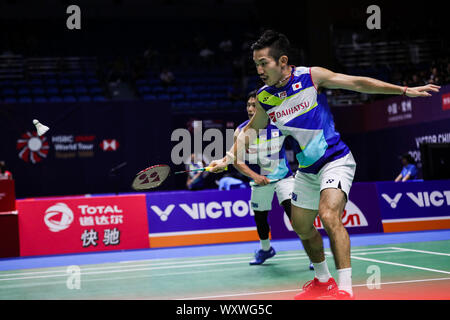 Japanese professional badminton players Takeshi Kamura and Keigo Sonoda ...