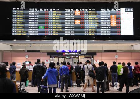 TAIPEI, TAIWAN - NOVEMBER 22, 2018: People wait at Taoyuan International Airport near Taipei, Taiwan. It is Taiwan's largest and busiest airport. Stock Photo