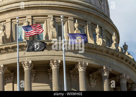 flags flying in downtown boise as shot from a public road Stock Photo