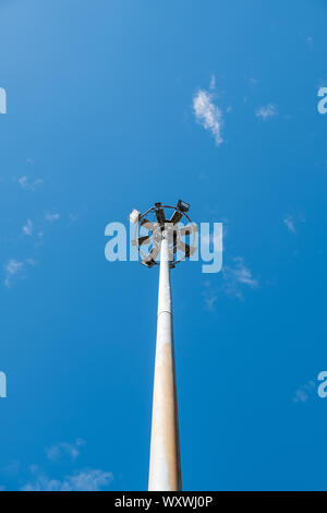 Led lamp pole under the clear blue sky for use in the football stadium. Stock Photo