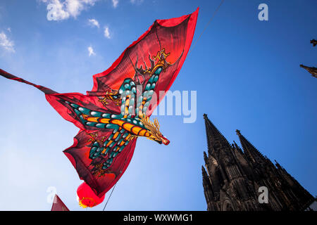 China festival on Roncalli square at the cathedral, dragon as decoration, Cologne, Germany.  Chinafest auf dem Roncalliplatz am Dom, Drache als Dekora Stock Photo