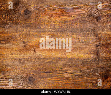Brown wood texture with scratches as background Stock Photo