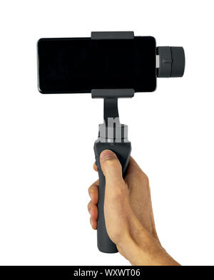 phone gimbal stabilizer in hand isolated on white background Stock Photo