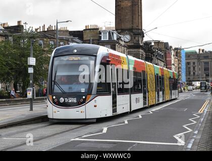 An Edinburgh Tram approaches the Atholl Crescent stop in Edinburgh's west end, Scotland, UK, Europe Stock Photo