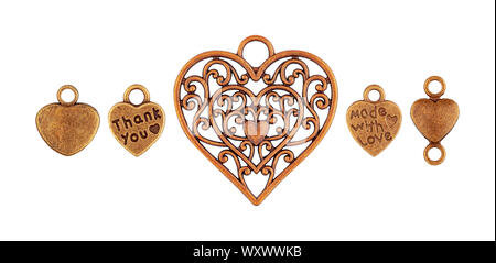 Set of metal old pendants in the shape of a heart isolated Stock Photo