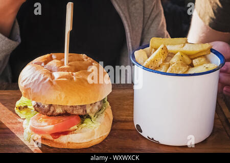 Close-up shot of burger and french fries Stock Photo
