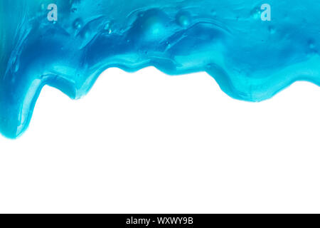 Abstact drips of blue paint or slime isolated on white Stock Photo
