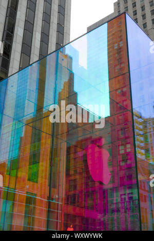 The iconic Apple store glass cube is in a temporary iridescent wrap, Fifth Avenue, NYC, USA Stock Photo